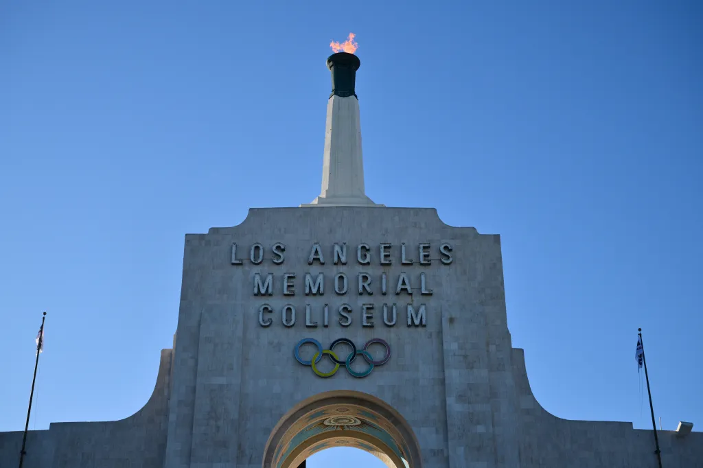The LA28 Olympic cauldron lit atop the Los Angeles Memorial Coliseum.
