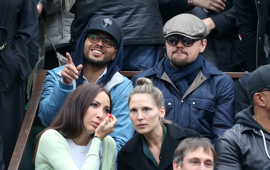 Leonardo DiCaprio and Richie Akiva watching the 2016 French Open with two women.