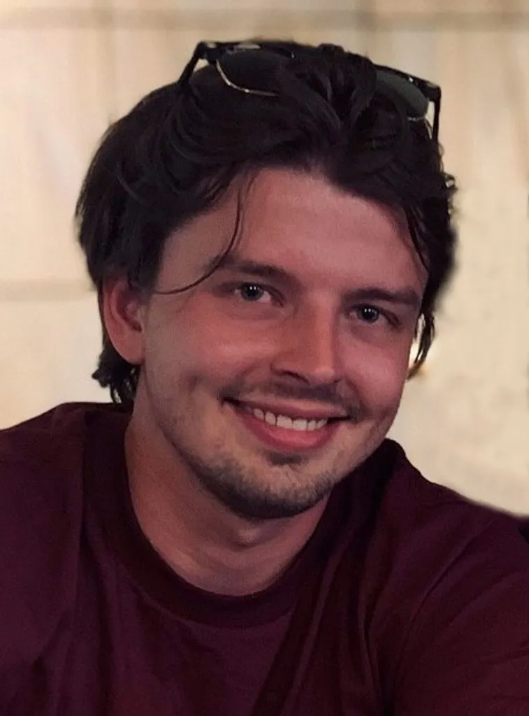 Dylan McGinnis, 24, was shot and killed by Lang on Oct. 1, 2021.