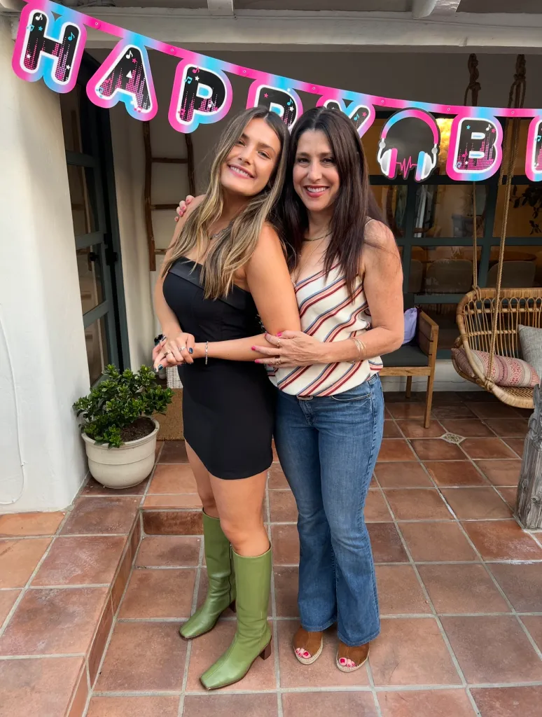 Chernov photographed with her daughter in their home before it burned down.