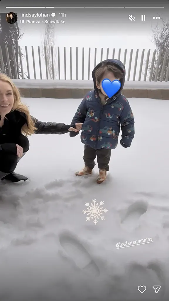 Lindsay Lohan and her son Luai in the snow.