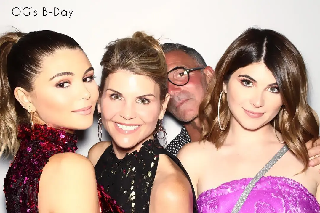 Olivia Jade, Lori Loughlin, Massimo Giannulli, and Bella at a birthday celebration.