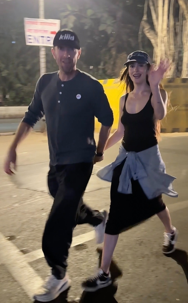Chris Martin and Dakota Johnson step out together.