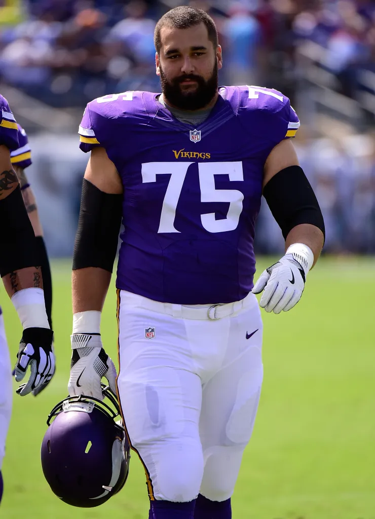 Matt Kalil #75 of the Minnesota Vikings watches from the sideline.