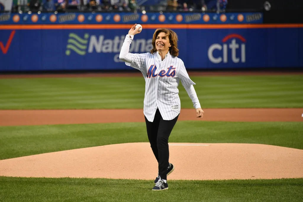 Mayor's Office of Media and Entertainment Commissioner Julie Menin throwing the first pitch at Citi Field.