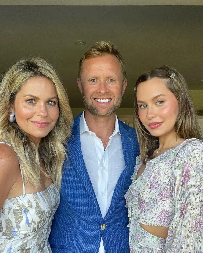 Candace Cameron Bure and Valeri Bure with their daughter.