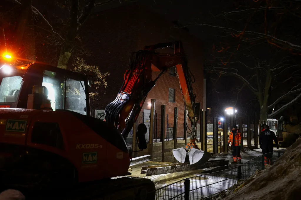 Men work on a construction site to restore electricity during a blackout, which left thousands of homes without power after a suspected arson attack at the Lichterfelde power plant in the Steglitz-Zehlendorf district in southern Berlin, Germany, January 4, 2026.