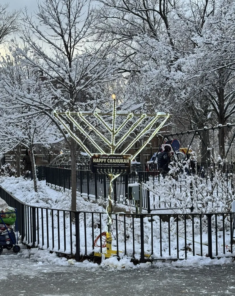 An outdoor menorah with a 