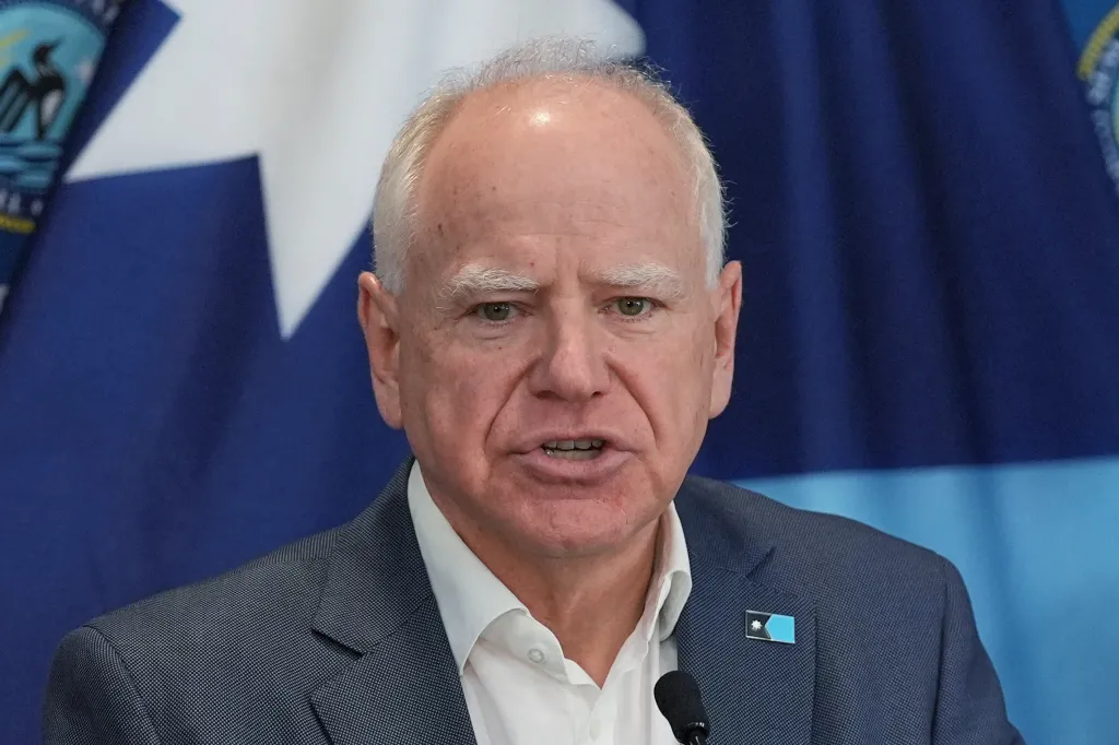 Minnesota Gov. Tim Walz speaking at a news conference.