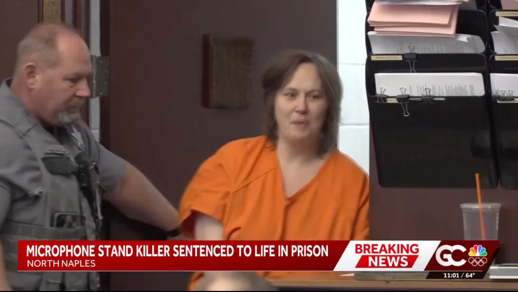 Amanda Cook is brought into a Naples courtroom yelling ahead of her sentencing hearing on Jan. 22, 2026.