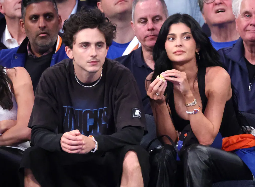 Actor Timothee Chalamet and Kylie Jenner watching the NBA Playoffs from the front row.