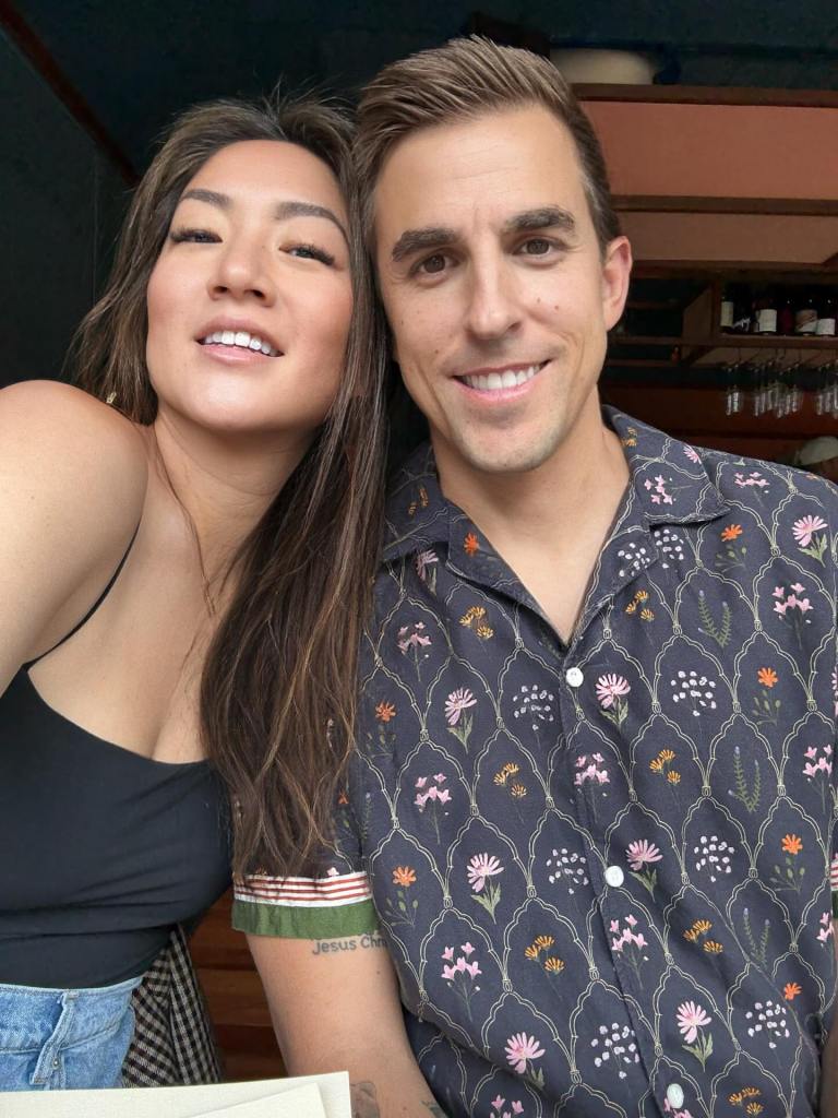 Janice Gott and her husband smiling at the camera.