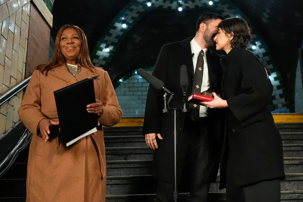 Zohran Mamdani embraces his wife Rama Duwaji after being sworn in as mayor of New York City.
