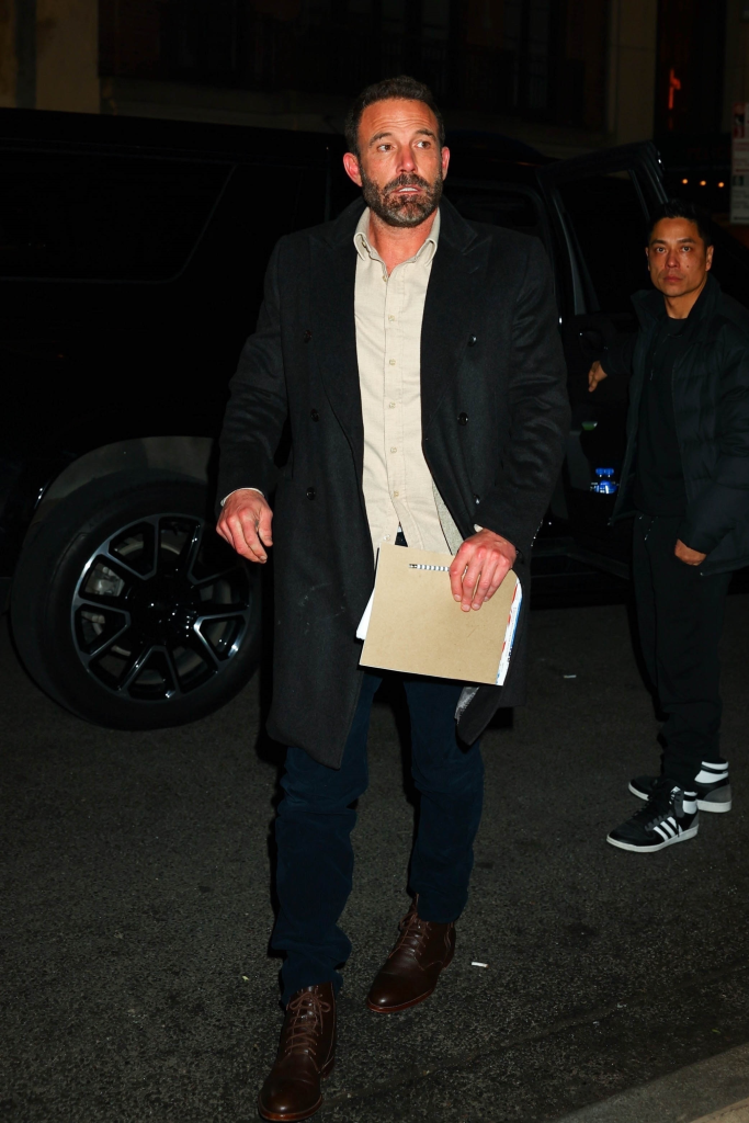 Actor Ben Affleck returning to his hotel at night in New York.