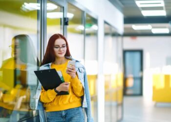 Dear Abby: My co-workers bully me for my baby face