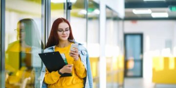 Dear Abby: My co-workers bully me for my baby face