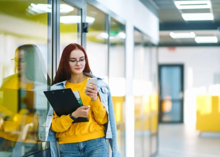 Dear Abby: My co-workers bully me for my baby face