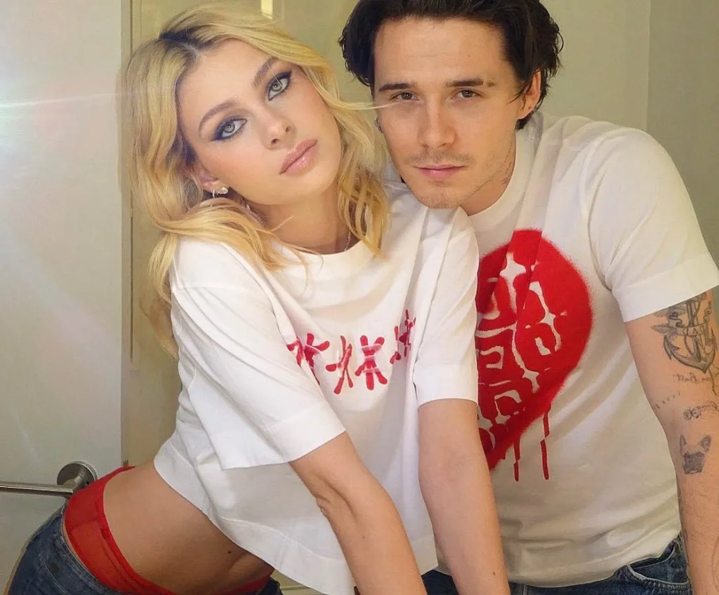 Nicola Peltz and Brooklyn Beckham posing for a selfie.