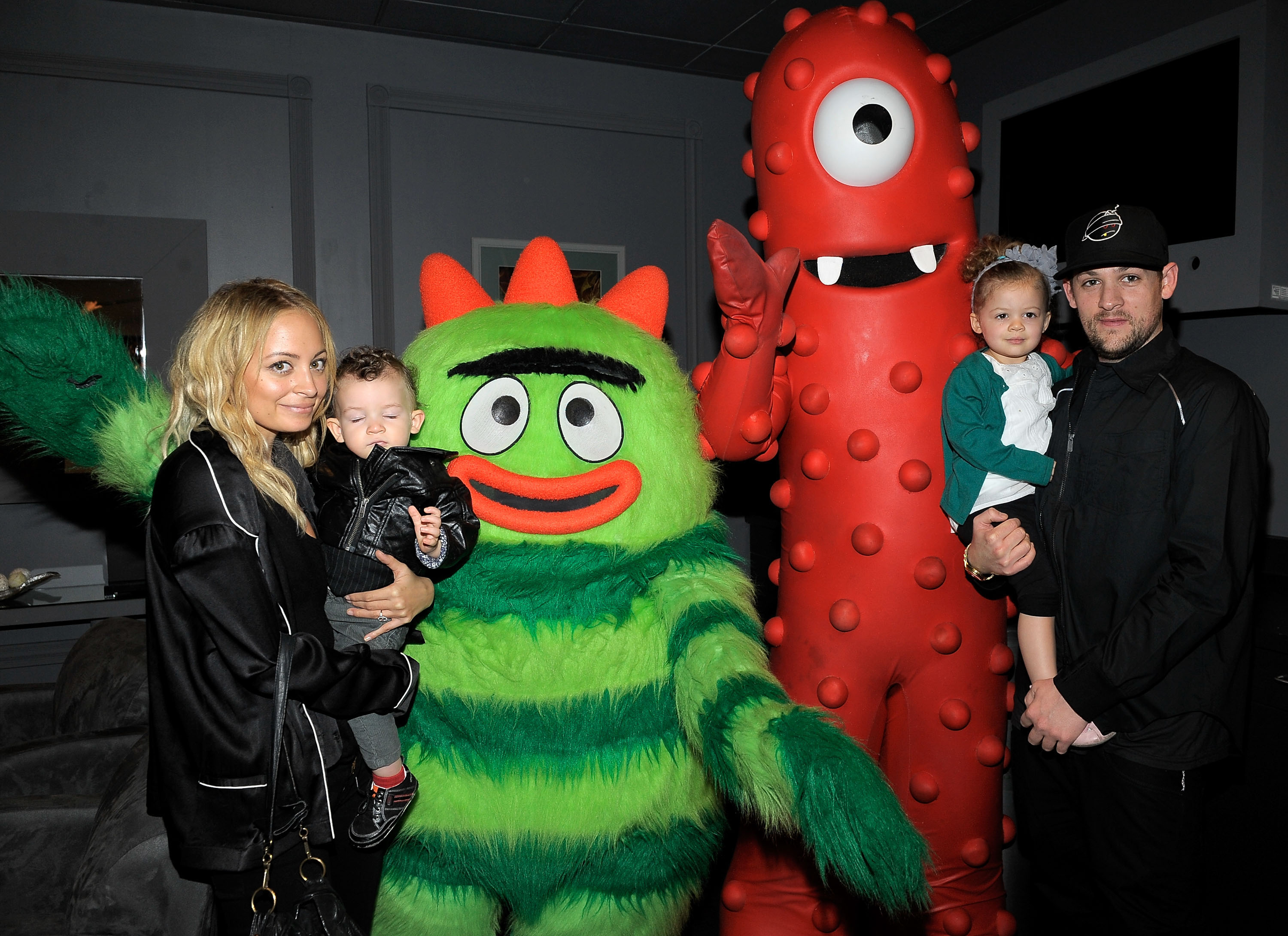 Nicole Richie and Joel Madden with their two children, Sparrow and Harlow, and Yo Gabba Gabba! characters.