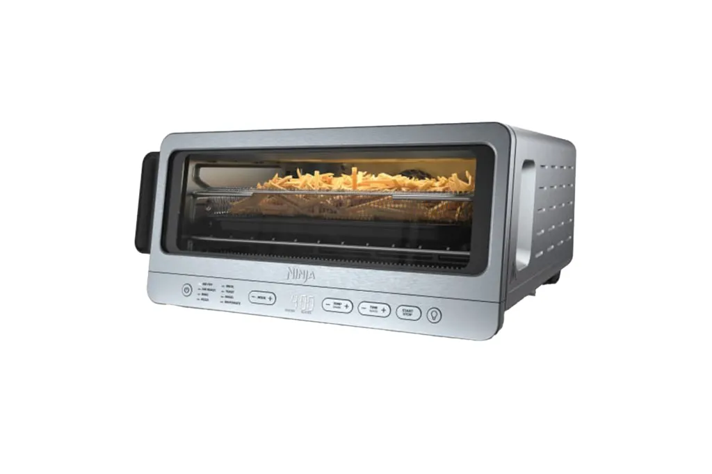 Ninja air fryer oven with french fries cooking.