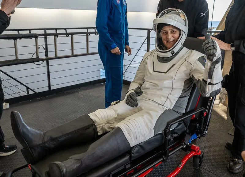 Suni Williams is helped out of a SpaceX Dragon spacecraft onboard the SpaceX recovery ship after returning from the International Space Station on March 18, 2025.