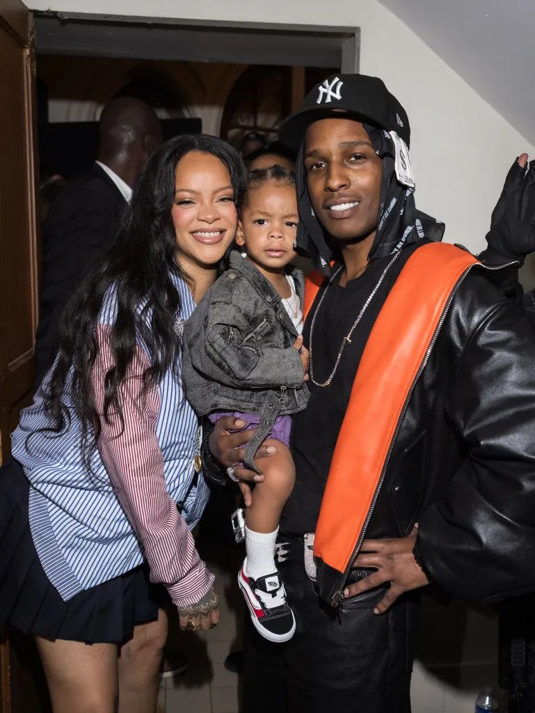Rihanna and A$AP Rocky with their son Riot at Paris Fashion Week.