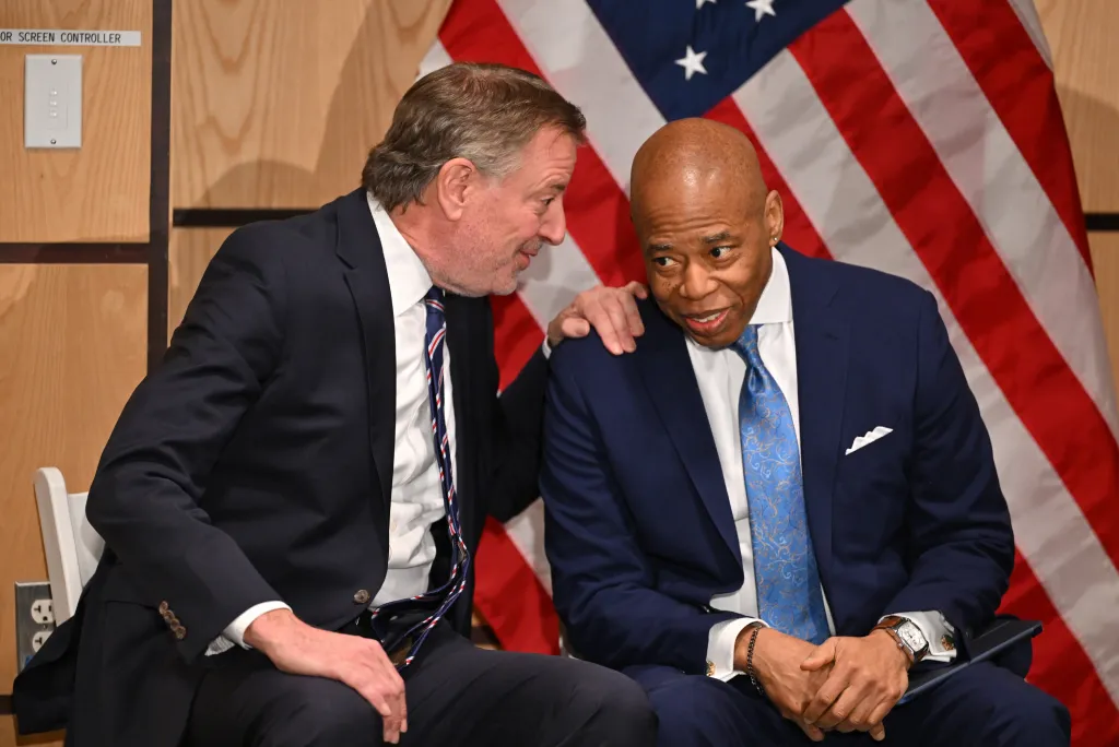 Former mayors NYC Eric Adams and Bill de Blasio talk.