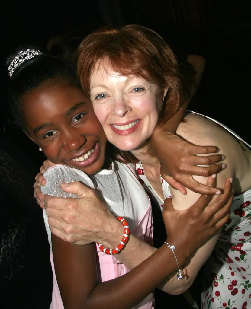 Kianna Underwood and Frances Fisher embracing at the Hairspray Opening Night after party.