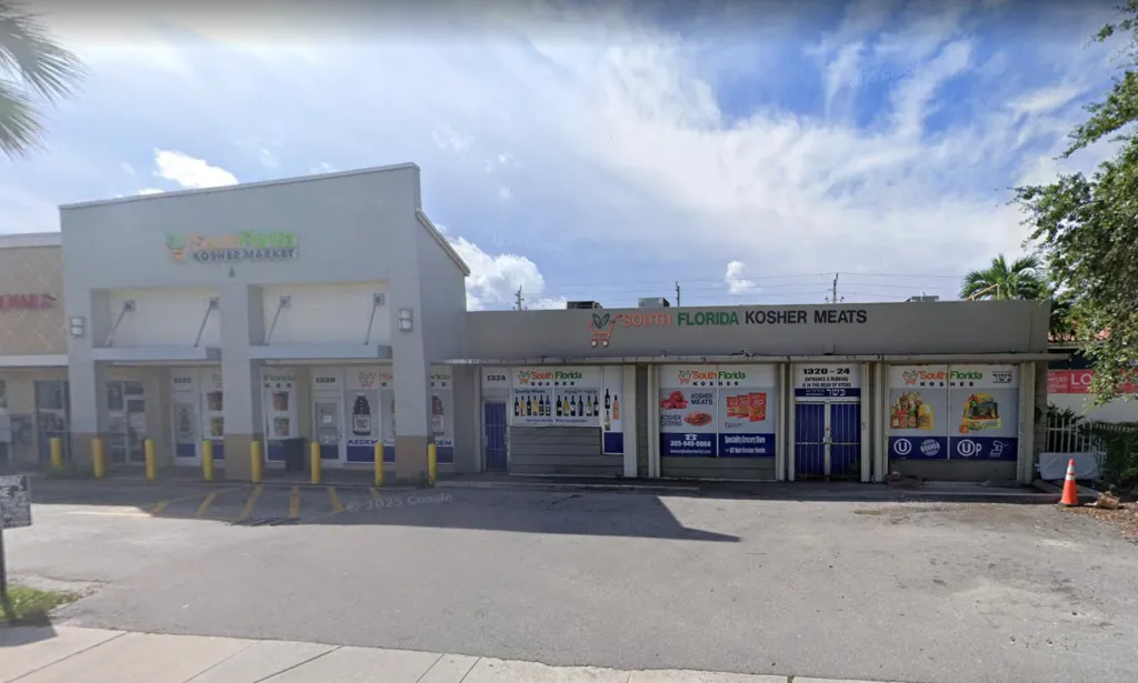 Exterior view of South Florida Kosher Market and South Florida Kosher Meats, two conjoined storefronts in a shopping plaza.