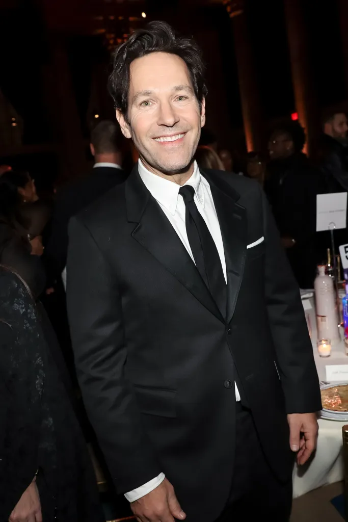 Paul Rudd smiling and looking forward.