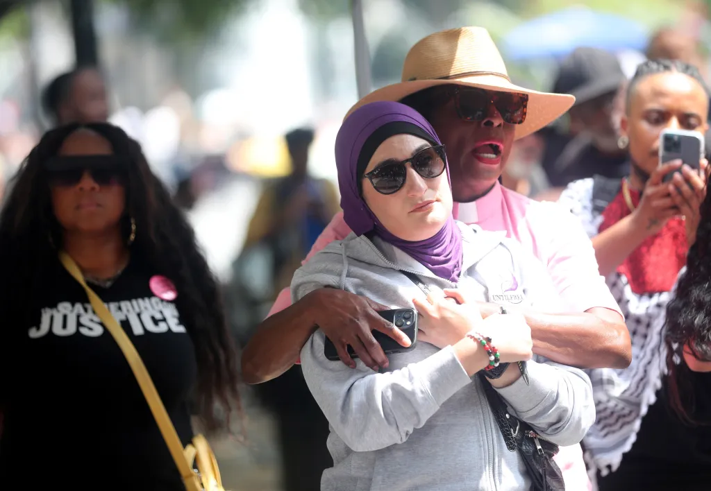 People at a peaceful protest for the murder of Sonya Massey.