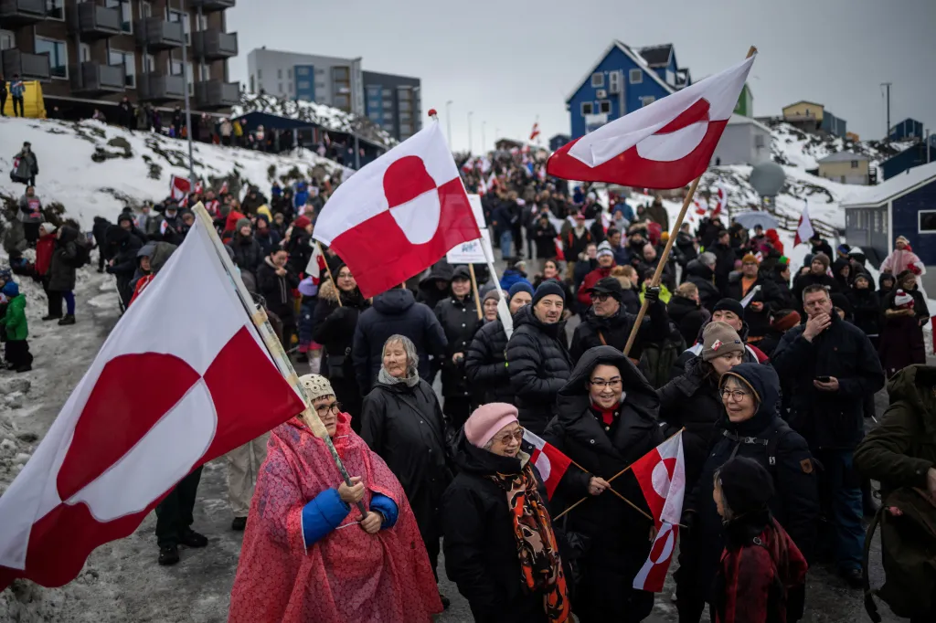 Protesters, many holding Greenlandic flags, gather in Nuuk, Greenland, to demonstrate against the U.S. demand for annexation.