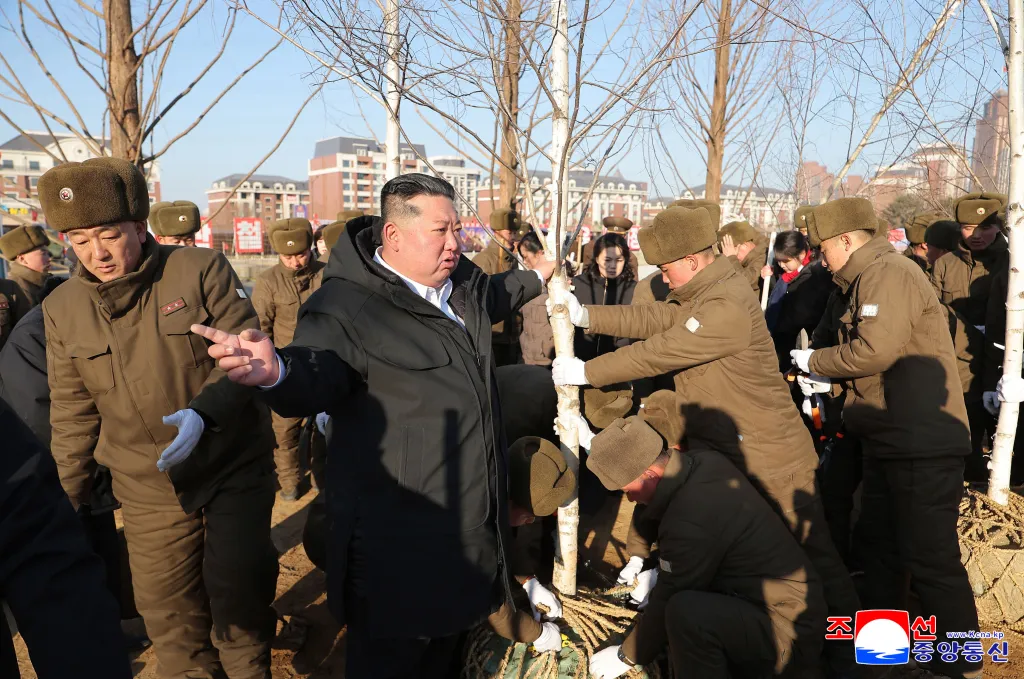 North Korean leader Kim Jong Un plants a tree at the construction site of the Memorial Museum of Combat Feats in Pyongyang on Jan. 5, 2026.