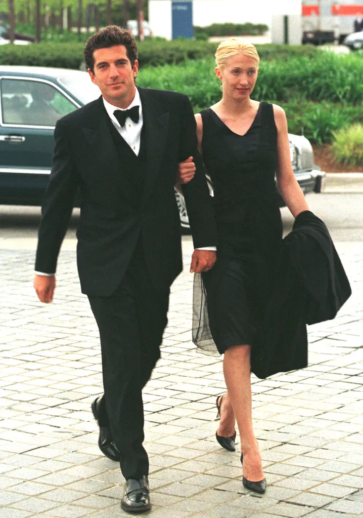John F. Kennedy Jr. in a black tuxedo suit, and Carolyn Bessette-Kennedy, in a black gown, arriving for a reception.