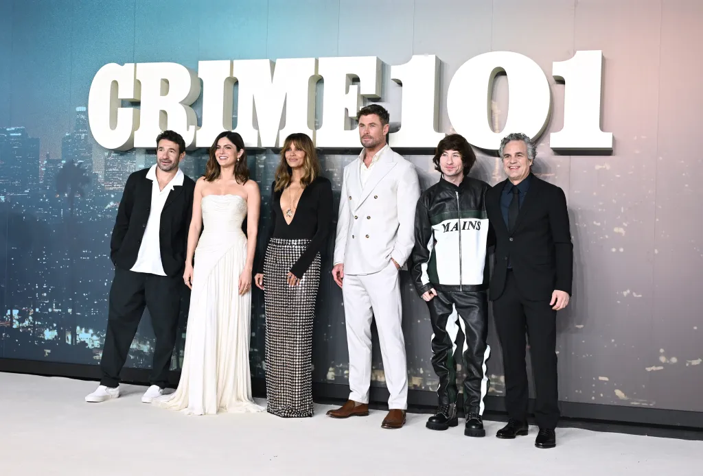 Bart Layton, Monica Barbaro, Halle Berry, Chris Hemsworth, Barry Keoghan, and Mark Ruffalo posing at the European Gala Screening for Amazon's CRIME 101.