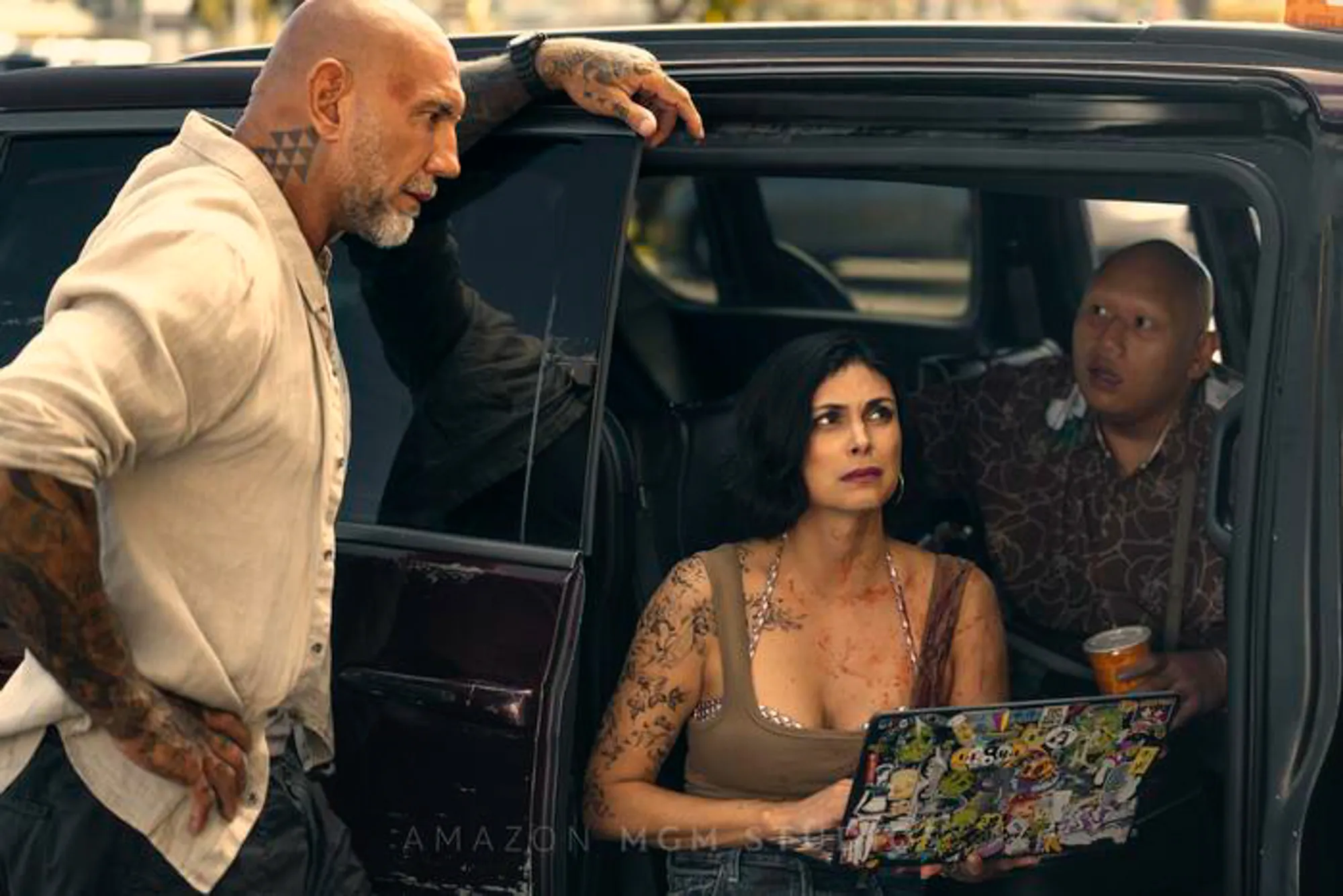 Dave Bautista, Morena Baccarin and Jacob Batalon in 