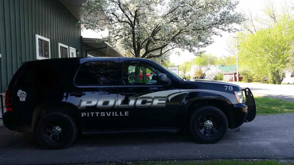 Pittsville Police vehicle parked in front of the Pittsville Police Department.