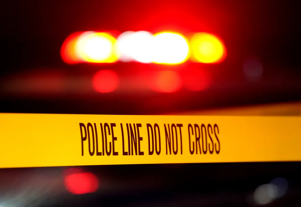 Yellow police tape with the words