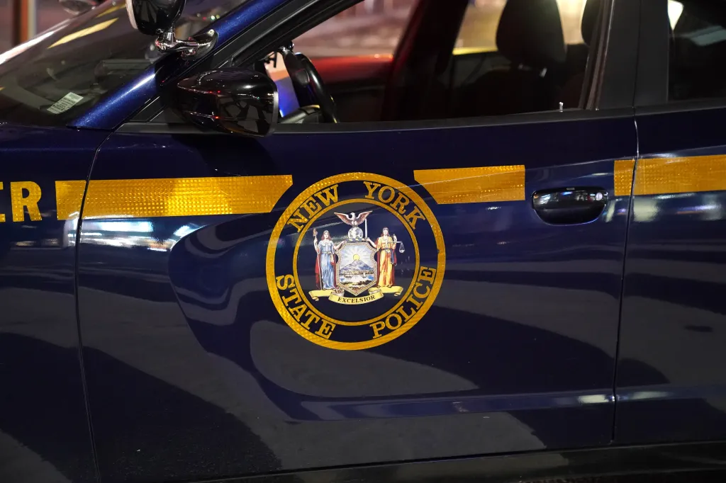 New York State Police vehicle with the State Police logo on the door.