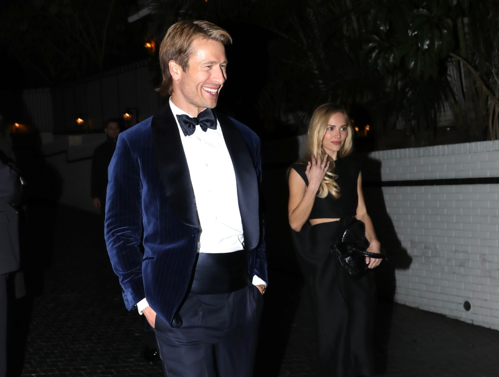 Glen Powell and Michelle Randolph at a Golden Globes after-party.