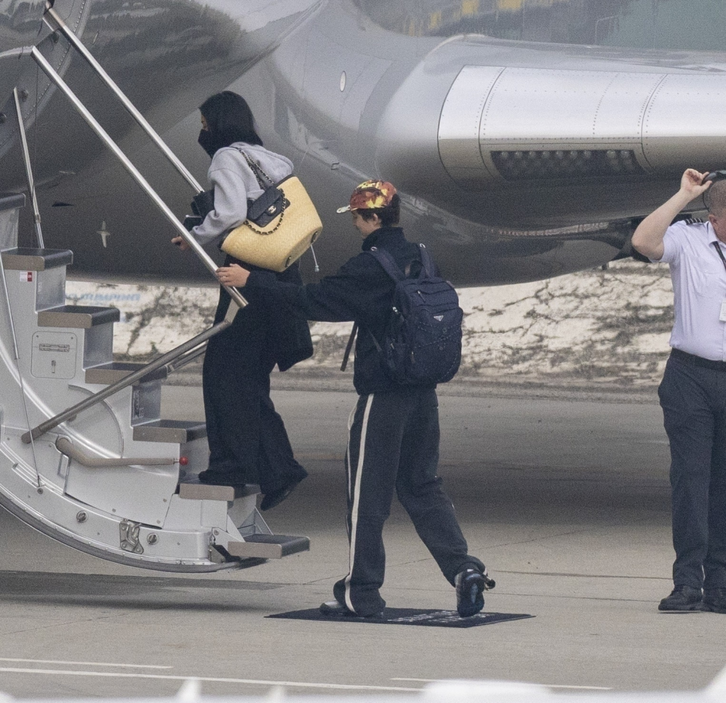 Kylie Jenner and Timothée Chalamet boarding a private jet.