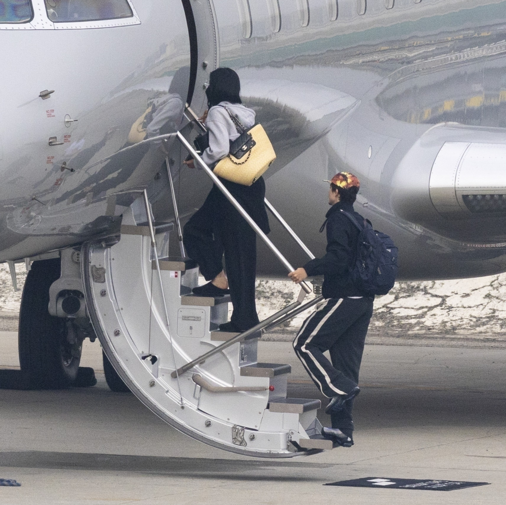 Kylie Jenner and Timothée Chalamet boarding a private jet.