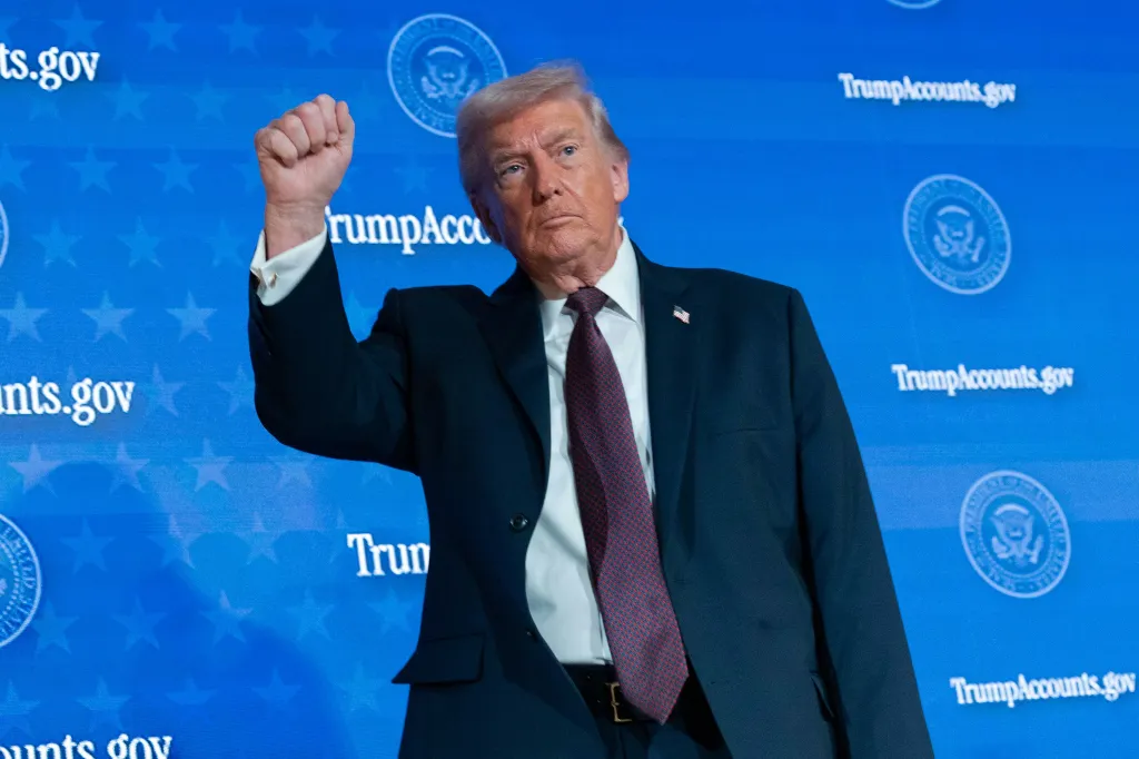 President Donald Trump waves to the crowd at the launch of the Trump Accounts program.