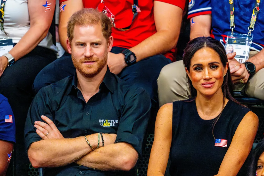 Prince Harry and Meghan Markle sitting together.