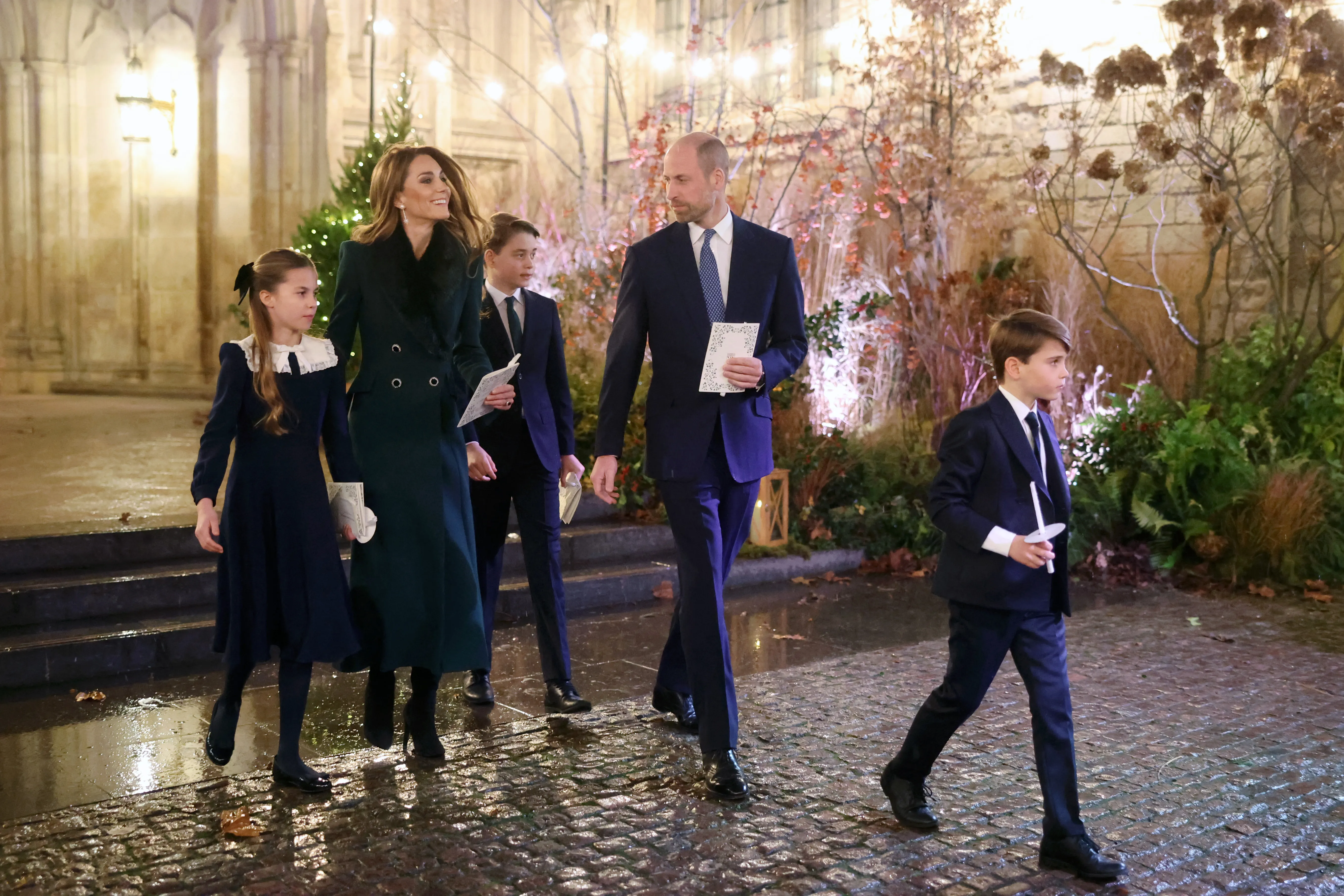 The Prince and Princess of Wales leave with their children, Princess Charlotte, Prince George and Prince Louis (right) following the Together At Christmas carol service at Westminster Abbey in London.
