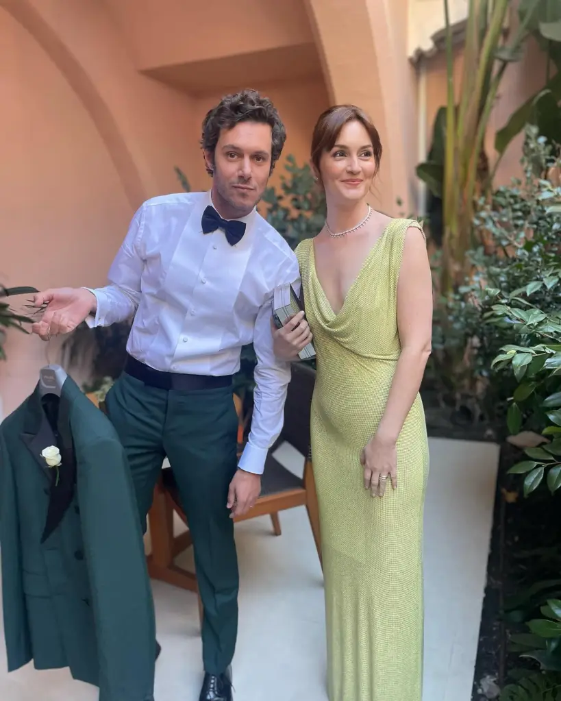 Leighton Meester in a green gown and Adam Brody in a tuxedo.