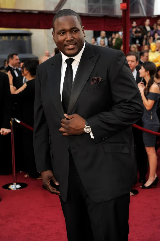 Quinton Aaron in a suit.