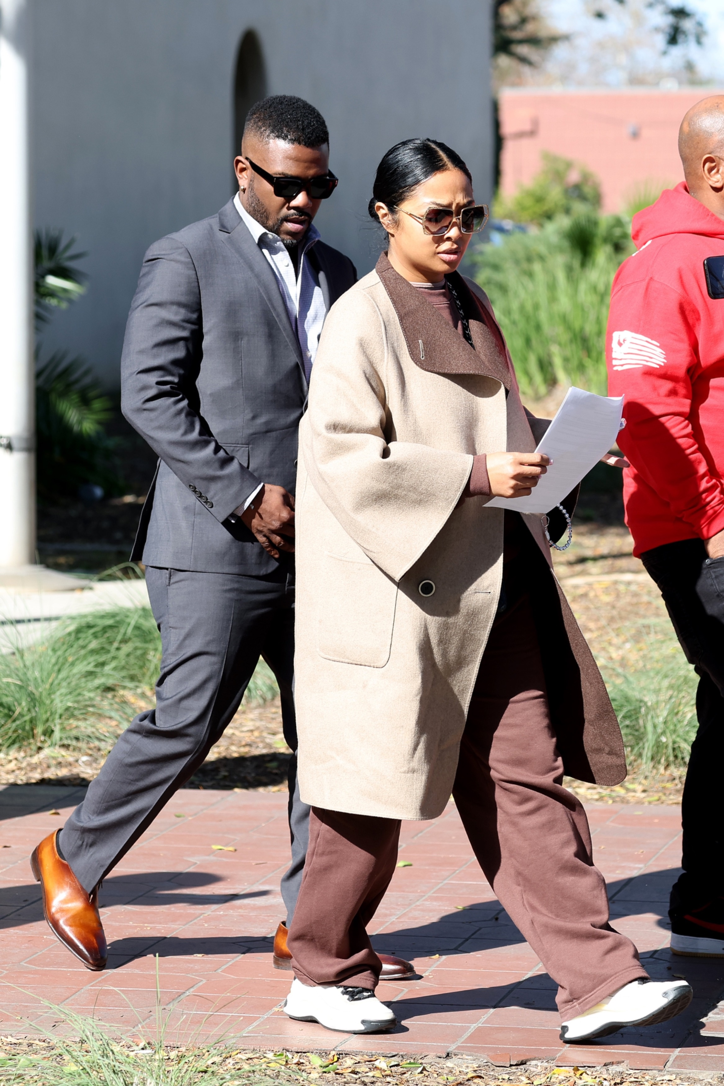 Ray J and Princess Love leave court.