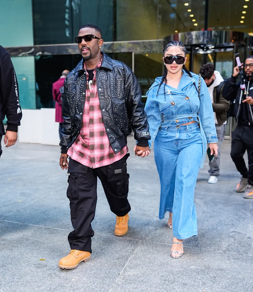 Ray J and Shila hold hands on a New York City street.