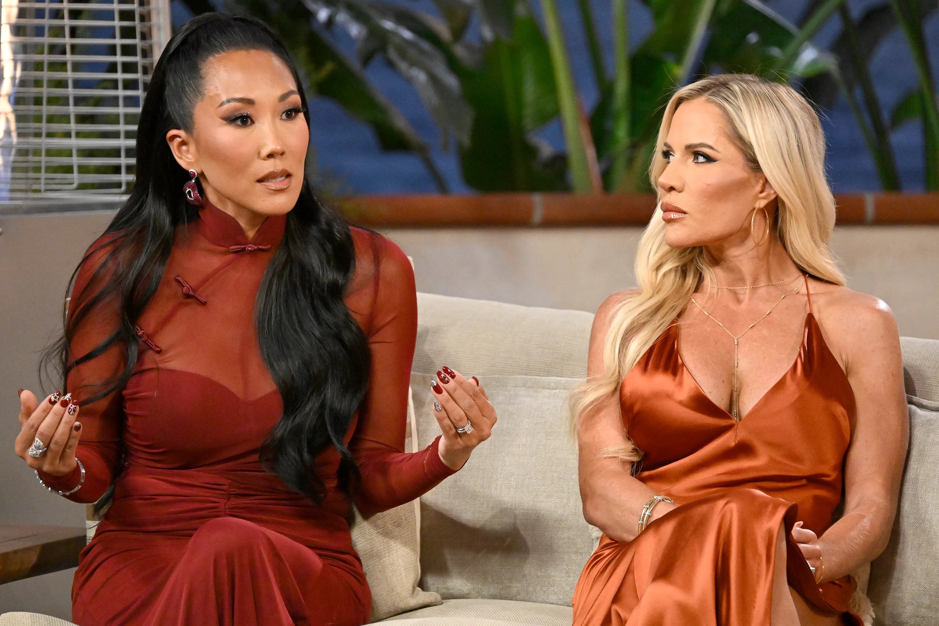 Katie Ginella and Jennifer Pedranti seated side-by-side, dressed in formal wear, engaged in conversation during the 